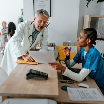 Healthcare professionals reviewing documentation